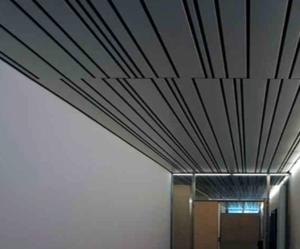 прямоугольный потолок ) Modern interior hallway with sleek metal ceiling, matte finish panels in linear arrangement, and subtle edge lighting.